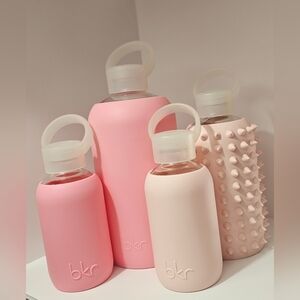 BKR set of glass bottles with silicone sleeves and caps.